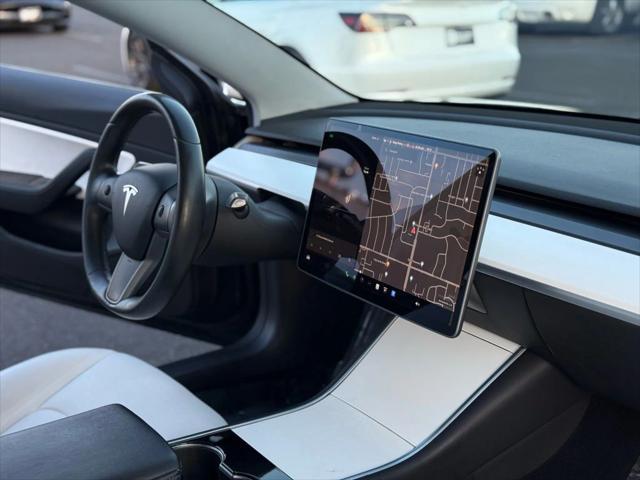 used 2019 Tesla Model 3 car, priced at $13,999