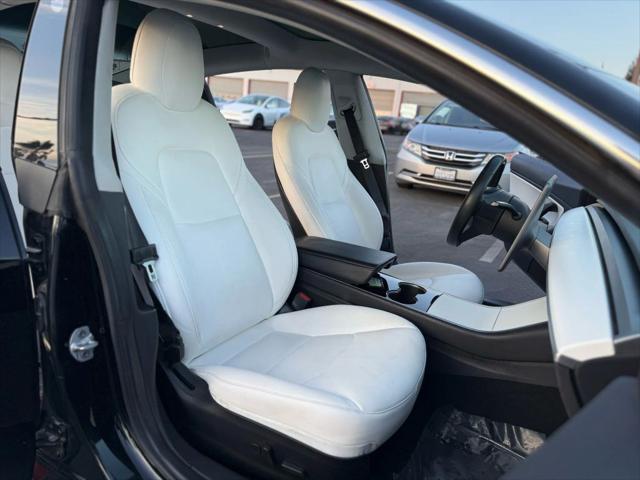 used 2019 Tesla Model 3 car, priced at $13,999