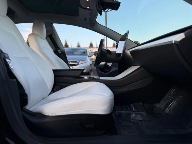 used 2019 Tesla Model 3 car, priced at $13,999