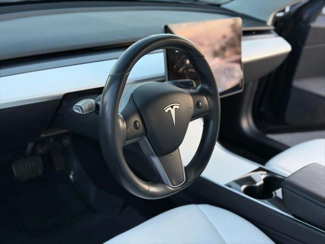 used 2019 Tesla Model 3 car, priced at $13,999