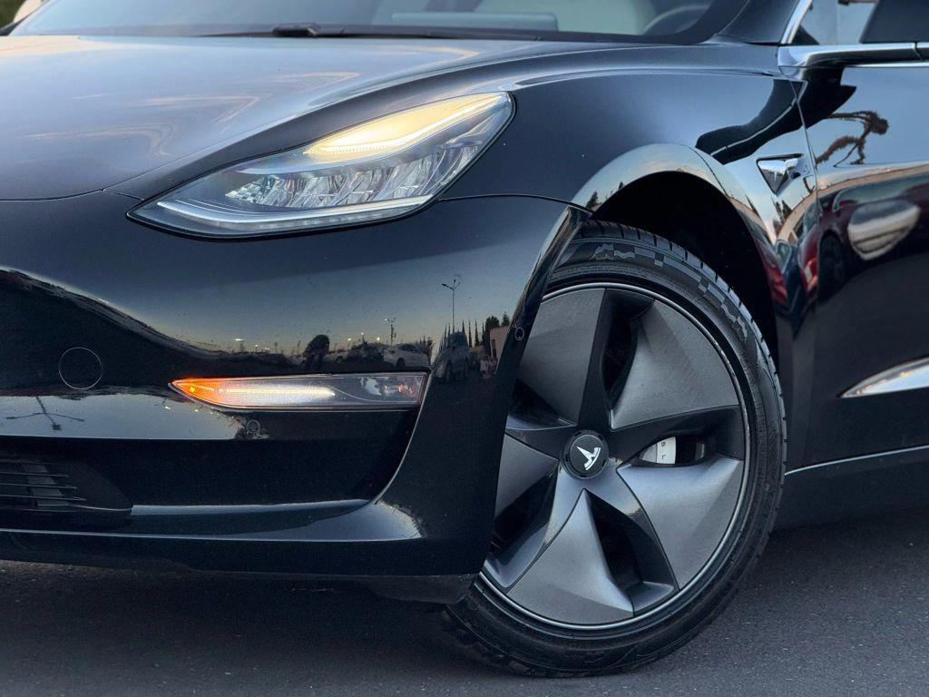 used 2019 Tesla Model 3 car, priced at $13,999