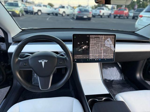 used 2019 Tesla Model 3 car, priced at $13,999