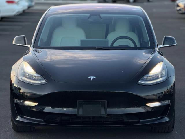 used 2019 Tesla Model 3 car, priced at $13,999