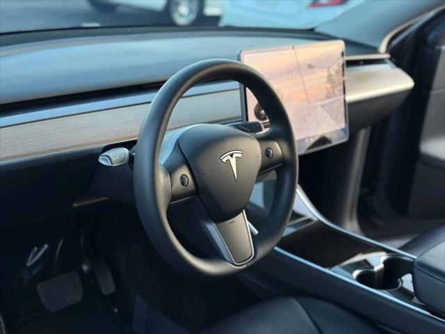 used 2021 Tesla Model Y car, priced at $26,999