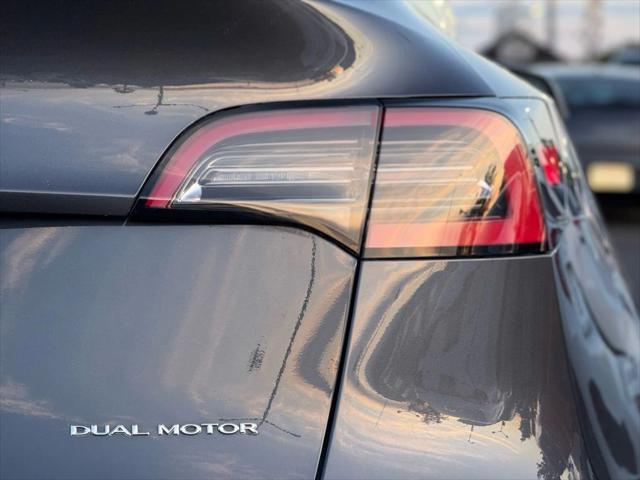 used 2021 Tesla Model Y car, priced at $26,999