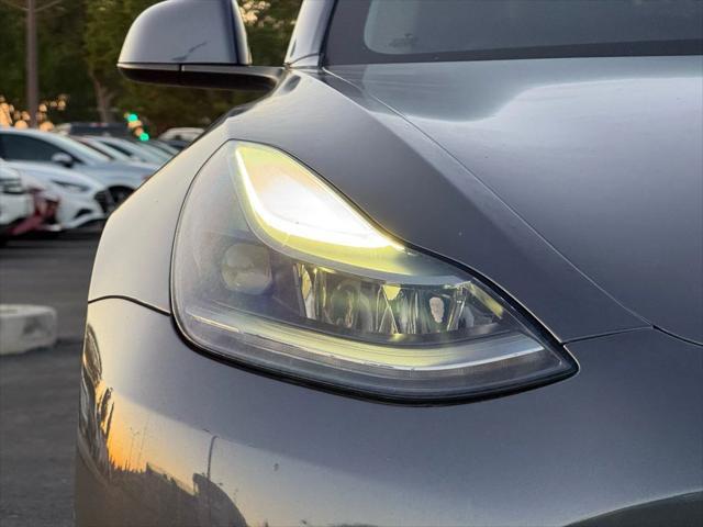 used 2021 Tesla Model 3 car, priced at $19,999