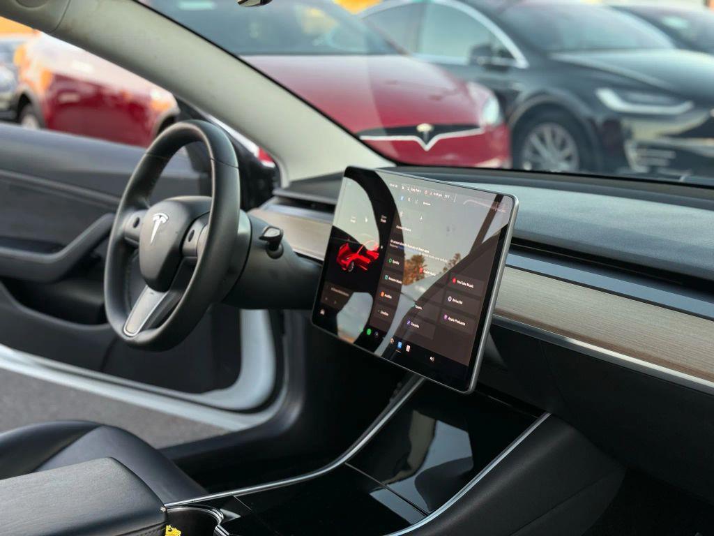 used 2019 Tesla Model 3 car, priced at $15,999