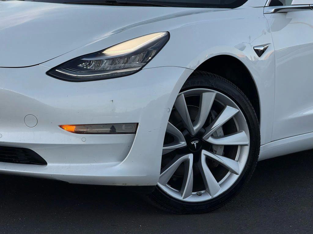 used 2019 Tesla Model 3 car, priced at $15,999