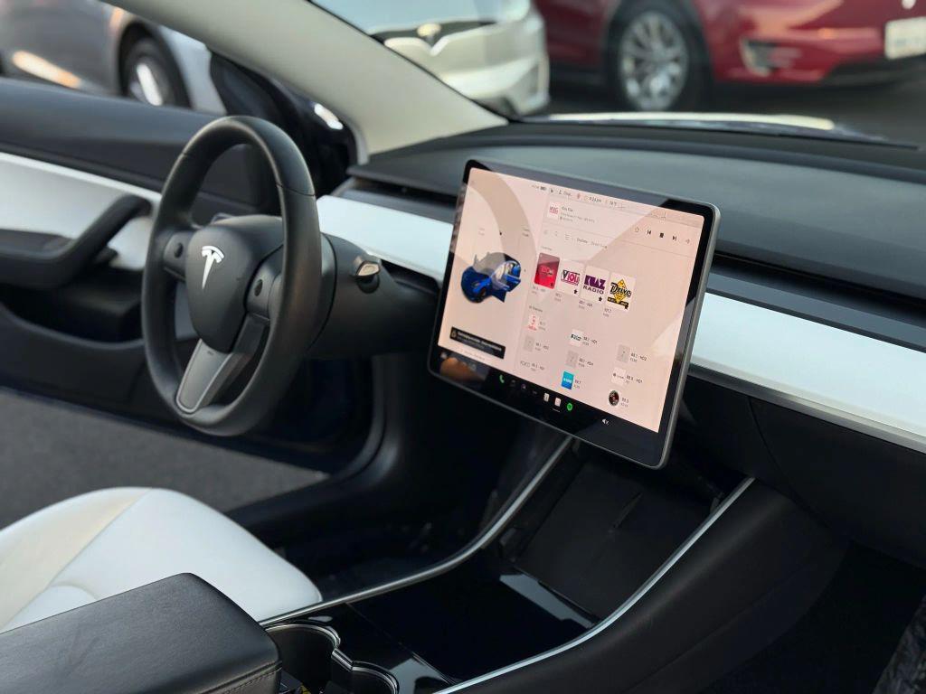 used 2020 Tesla Model 3 car, priced at $16,999
