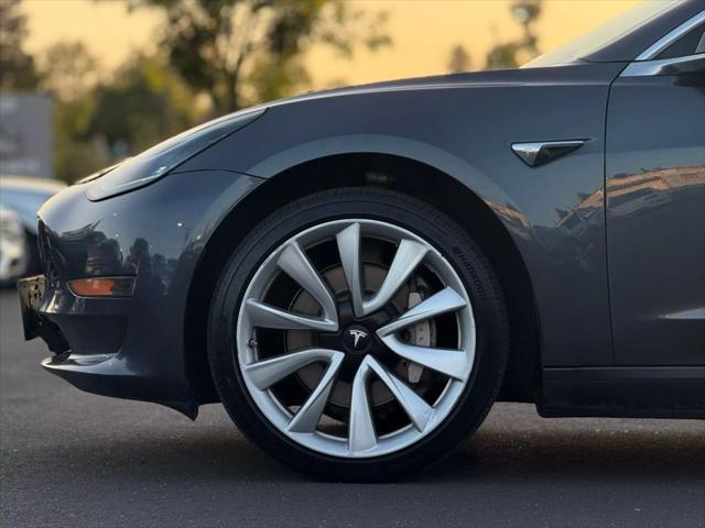 used 2018 Tesla Model 3 car, priced at $15,499