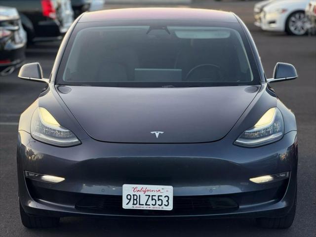 used 2018 Tesla Model 3 car, priced at $15,499
