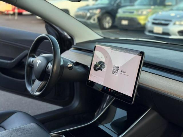 used 2018 Tesla Model 3 car, priced at $15,499