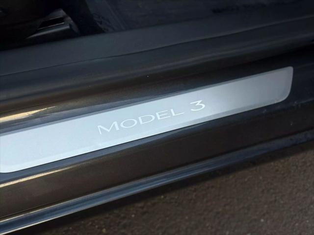 used 2018 Tesla Model 3 car, priced at $15,499