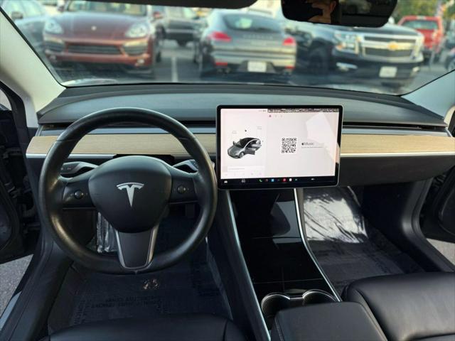 used 2018 Tesla Model 3 car, priced at $15,499