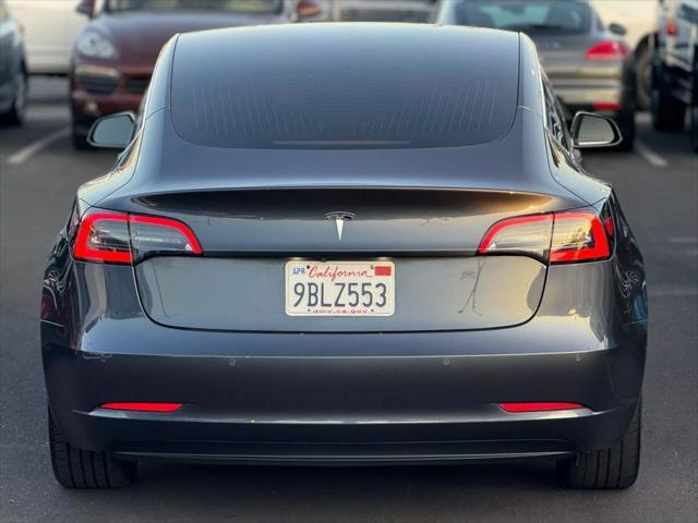 used 2018 Tesla Model 3 car, priced at $15,499