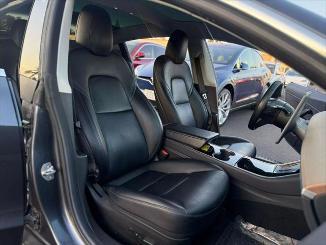 used 2018 Tesla Model 3 car, priced at $15,499