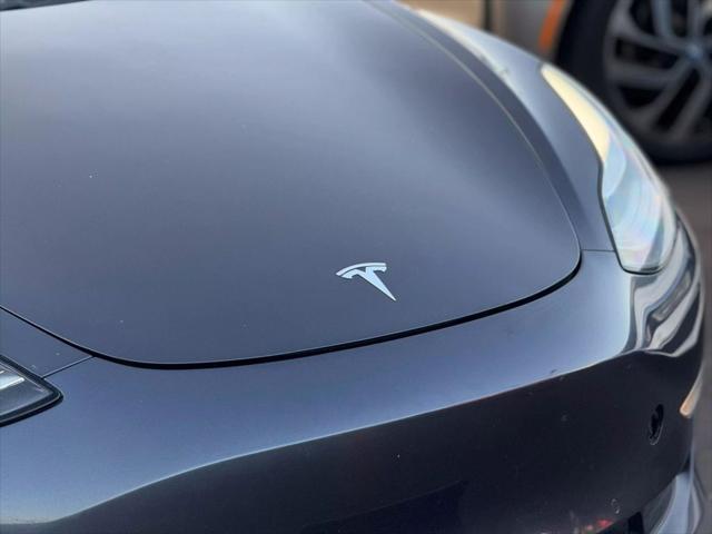 used 2018 Tesla Model 3 car, priced at $15,499