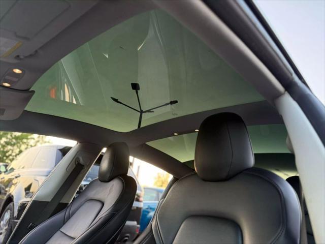 used 2018 Tesla Model 3 car, priced at $15,499