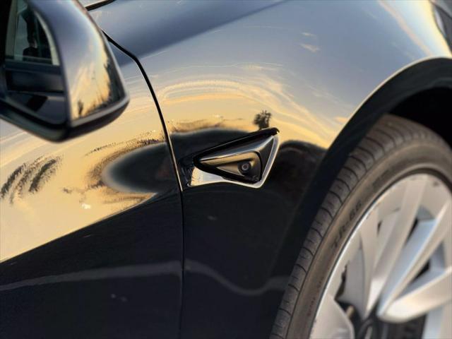 used 2022 Tesla Model 3 car, priced at $17,499