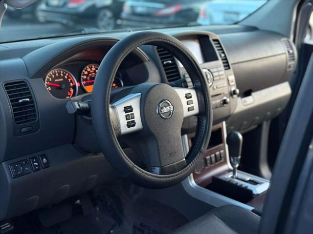 used 2010 Nissan Pathfinder car, priced at $5,499