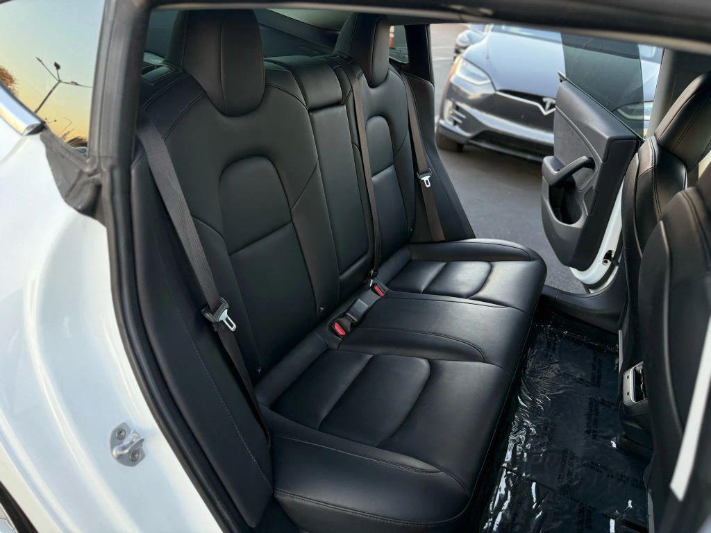 used 2018 Tesla Model 3 car, priced at $15,499