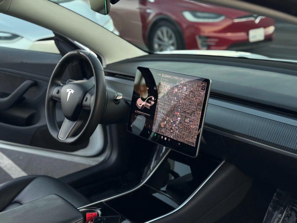 used 2018 Tesla Model 3 car, priced at $15,499