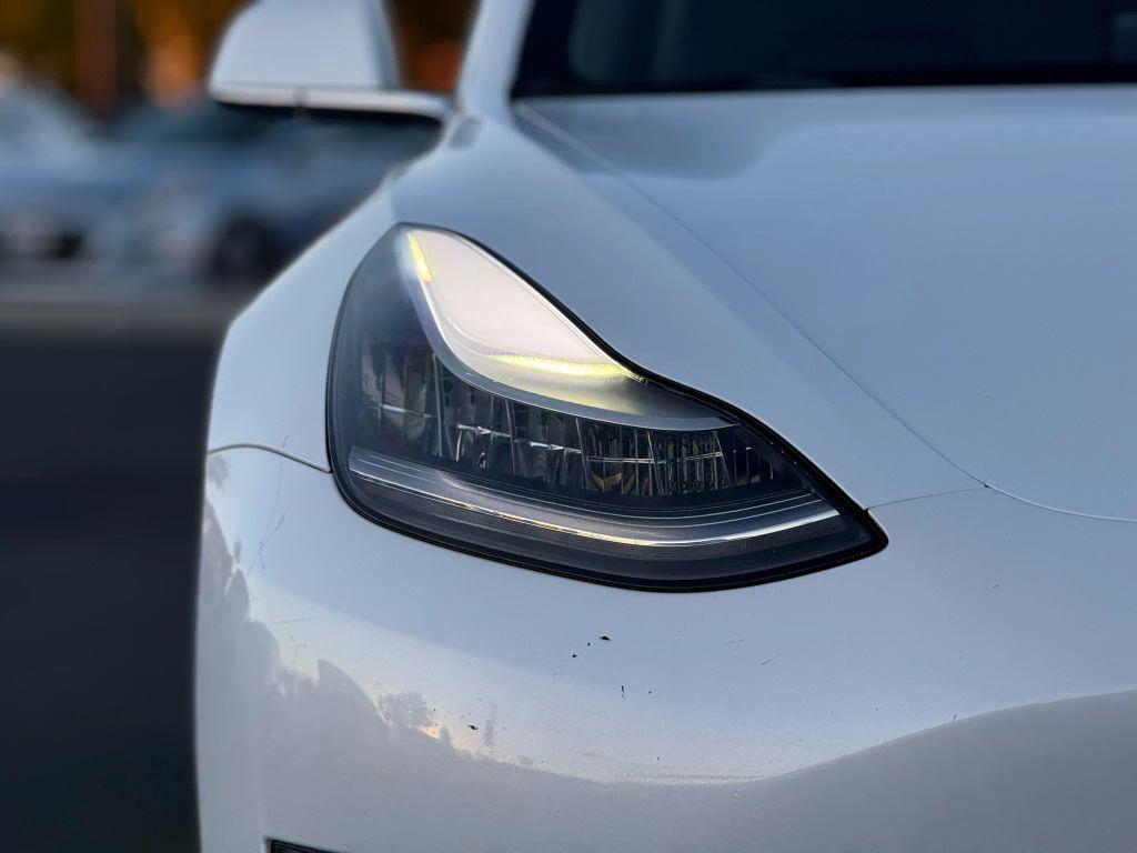 used 2018 Tesla Model 3 car, priced at $15,499