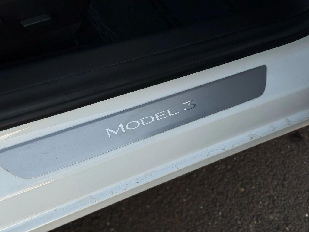 used 2018 Tesla Model 3 car, priced at $15,499