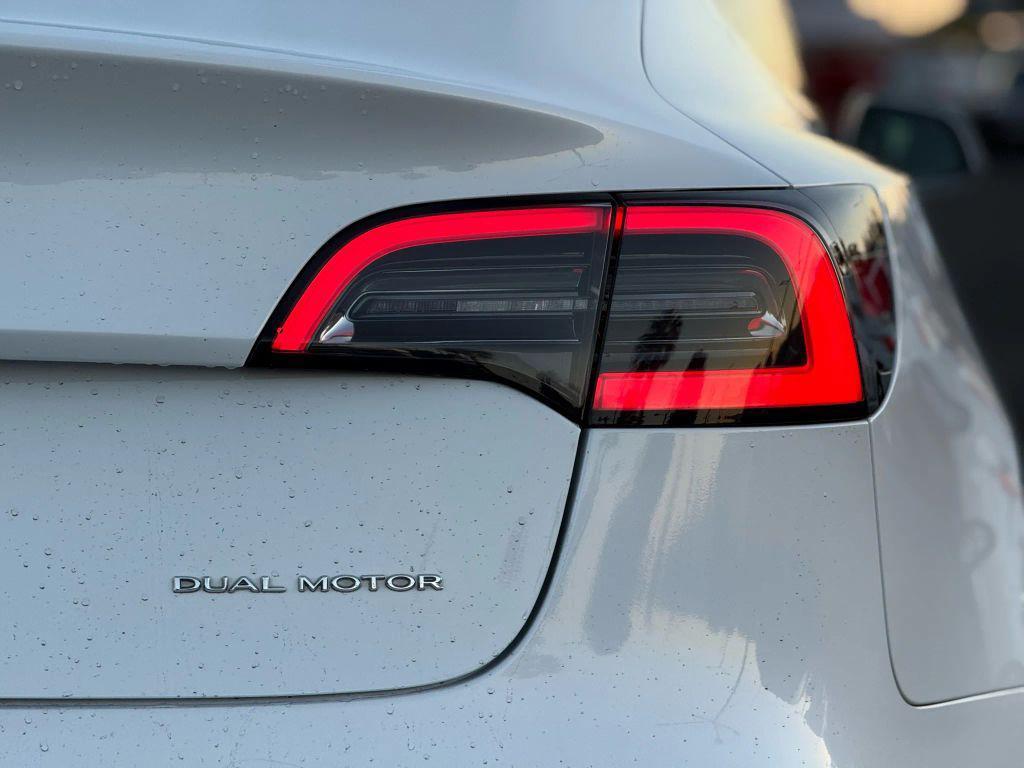 used 2018 Tesla Model 3 car, priced at $15,499