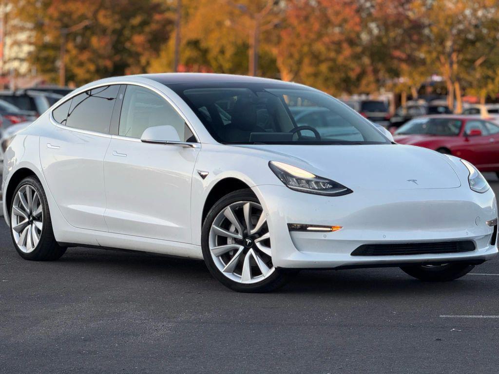 used 2018 Tesla Model 3 car, priced at $15,499