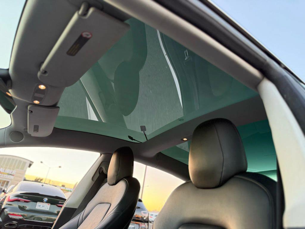 used 2018 Tesla Model 3 car, priced at $15,499