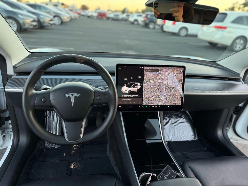 used 2018 Tesla Model 3 car, priced at $15,499
