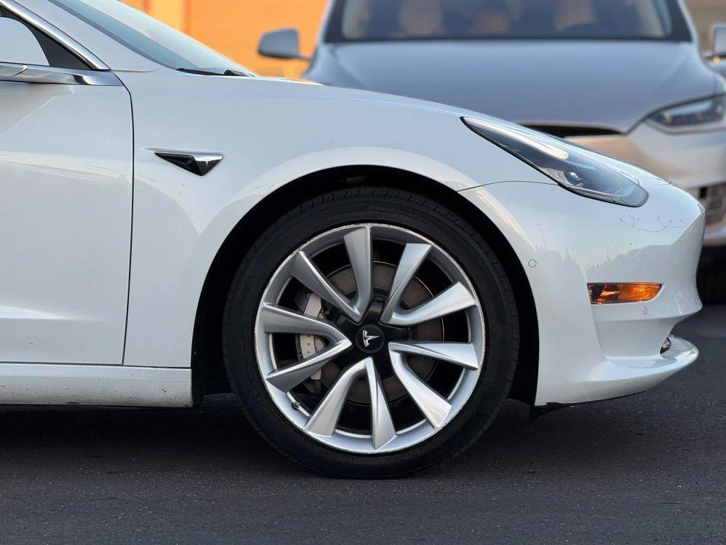 used 2018 Tesla Model 3 car, priced at $15,499