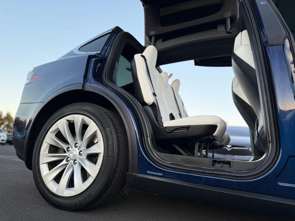 used 2018 Tesla Model X car, priced at $26,999