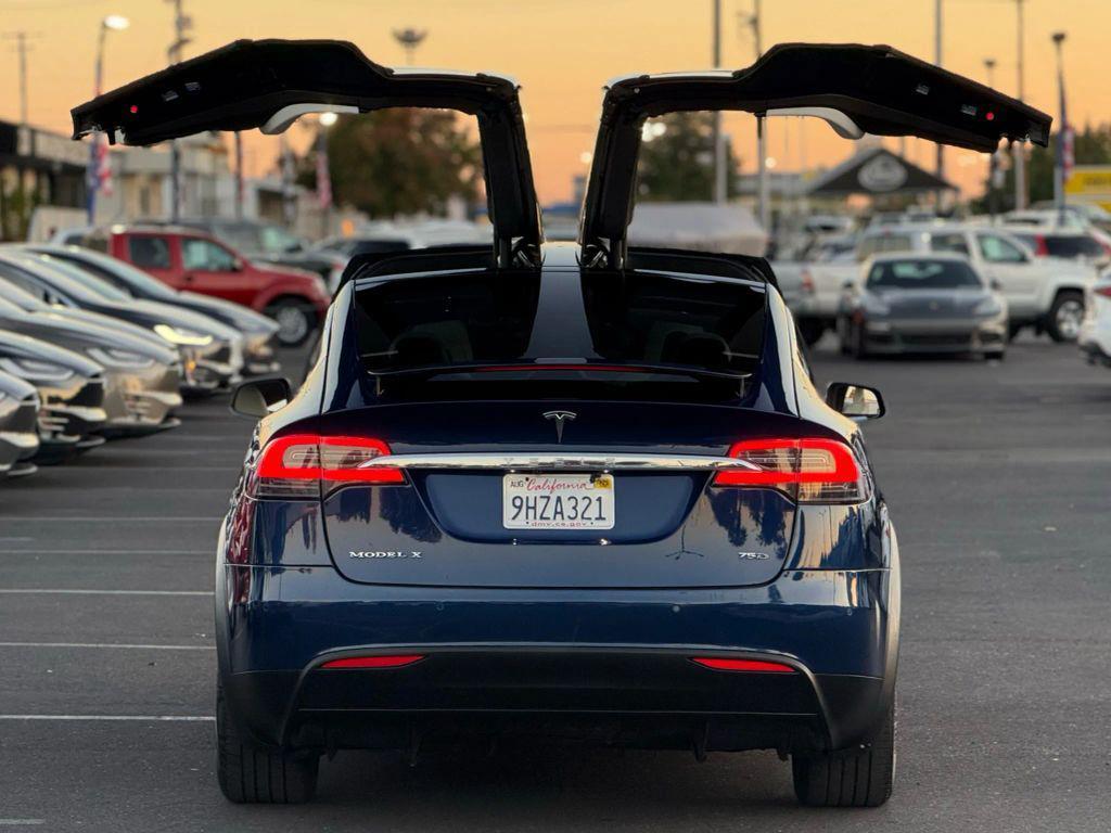 used 2018 Tesla Model X car, priced at $26,999