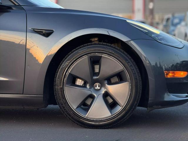 used 2022 Tesla Model 3 car, priced at $18,999