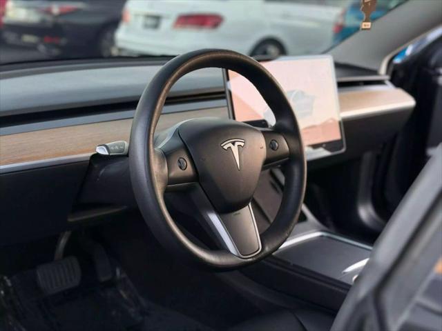 used 2022 Tesla Model 3 car, priced at $18,999