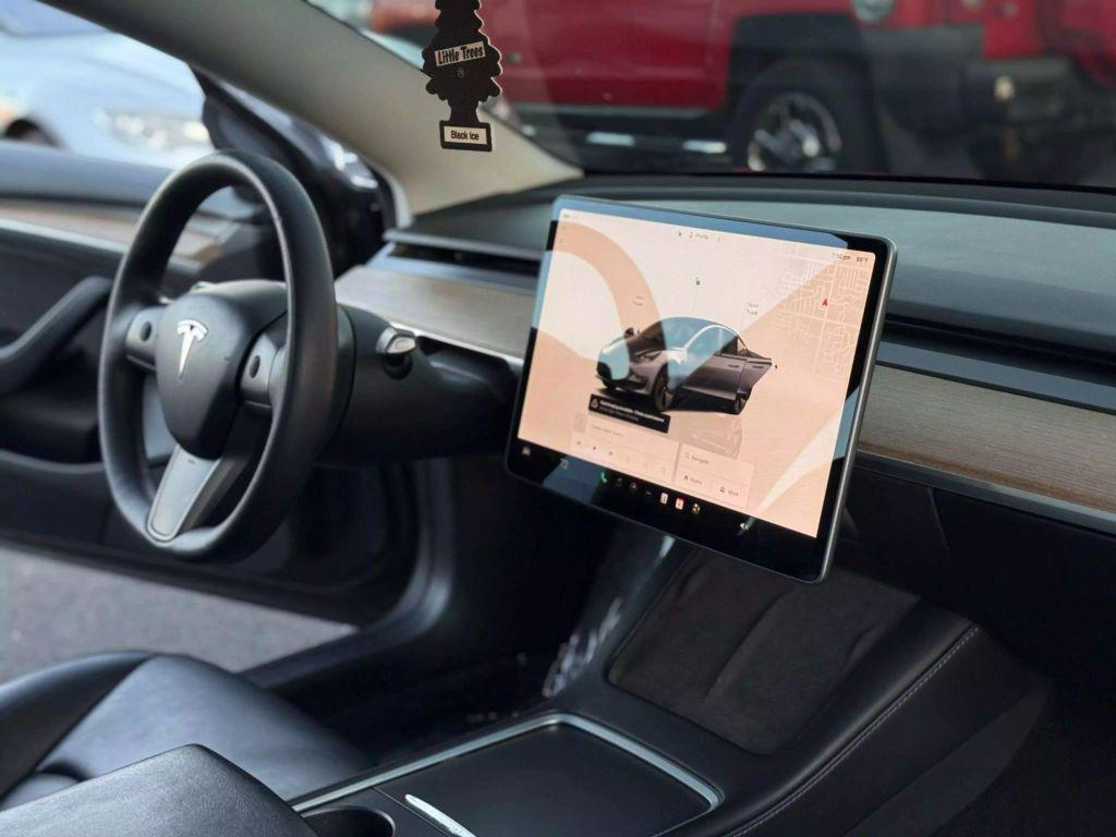used 2022 Tesla Model 3 car, priced at $17,999