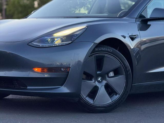 used 2022 Tesla Model 3 car, priced at $18,999