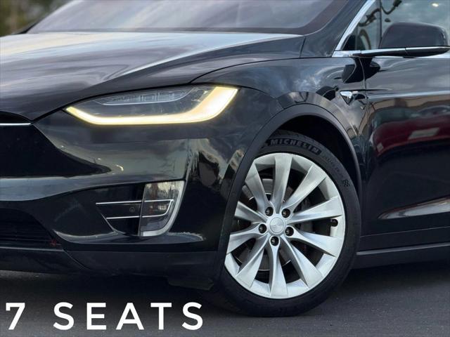 used 2018 Tesla Model X car, priced at $17,999