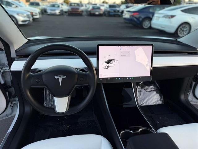 used 2018 Tesla Model 3 car, priced at $13,499