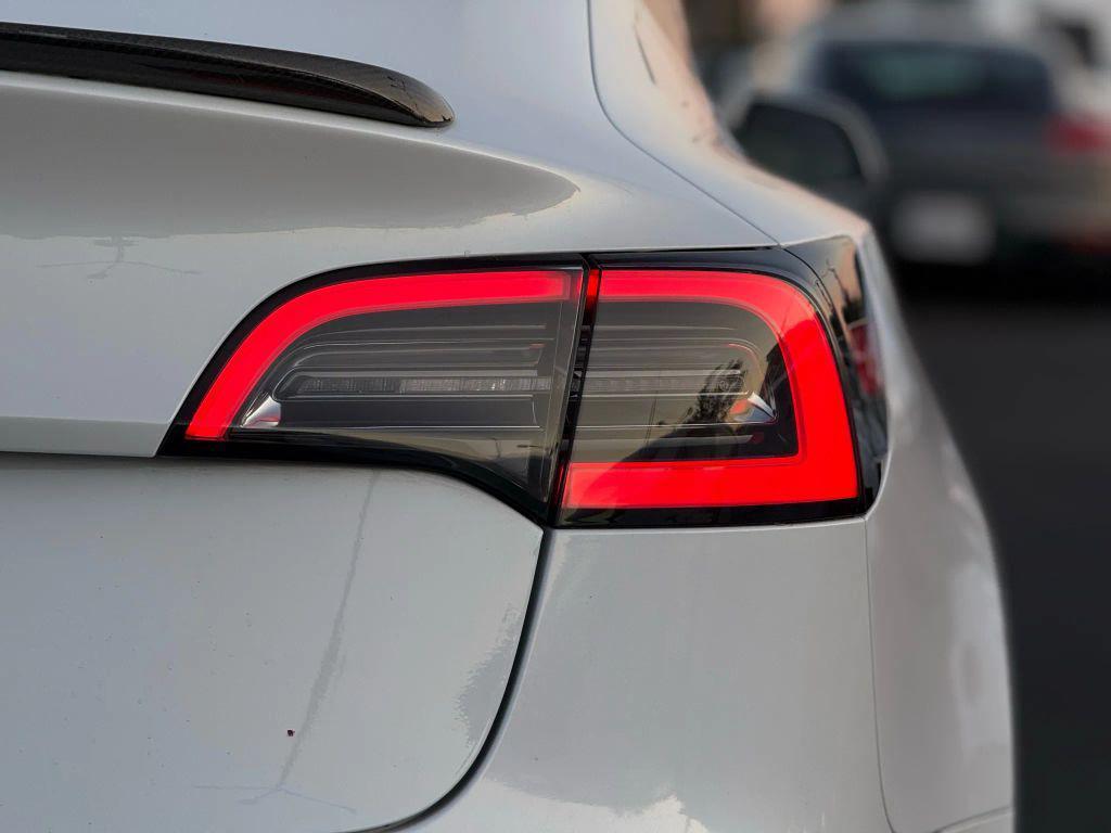 used 2018 Tesla Model 3 car, priced at $13,999