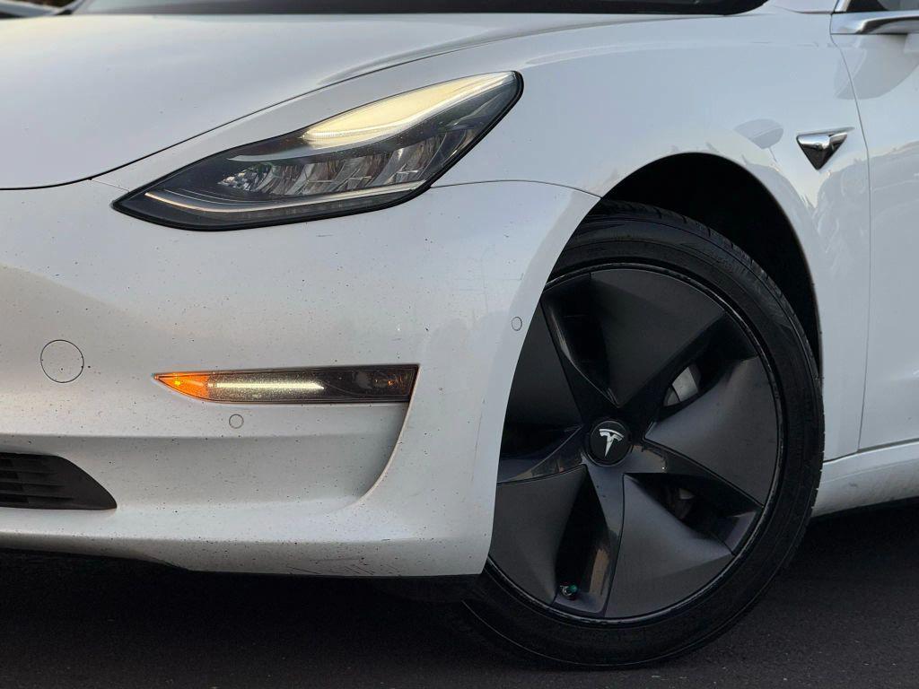 used 2018 Tesla Model 3 car, priced at $13,999
