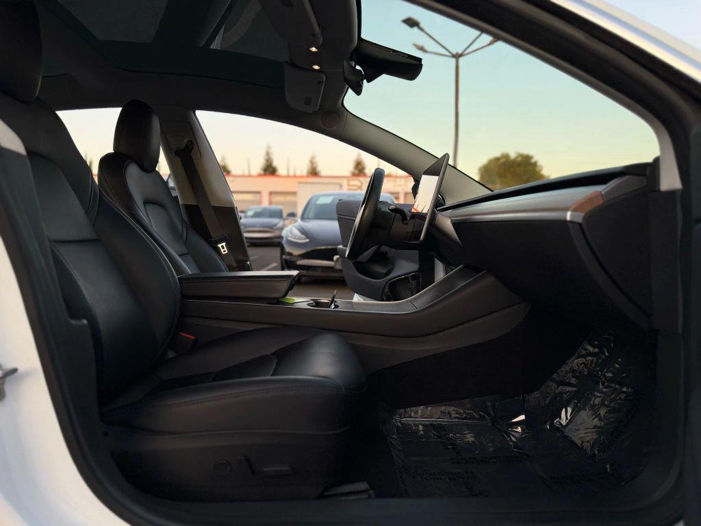 used 2018 Tesla Model 3 car, priced at $13,999