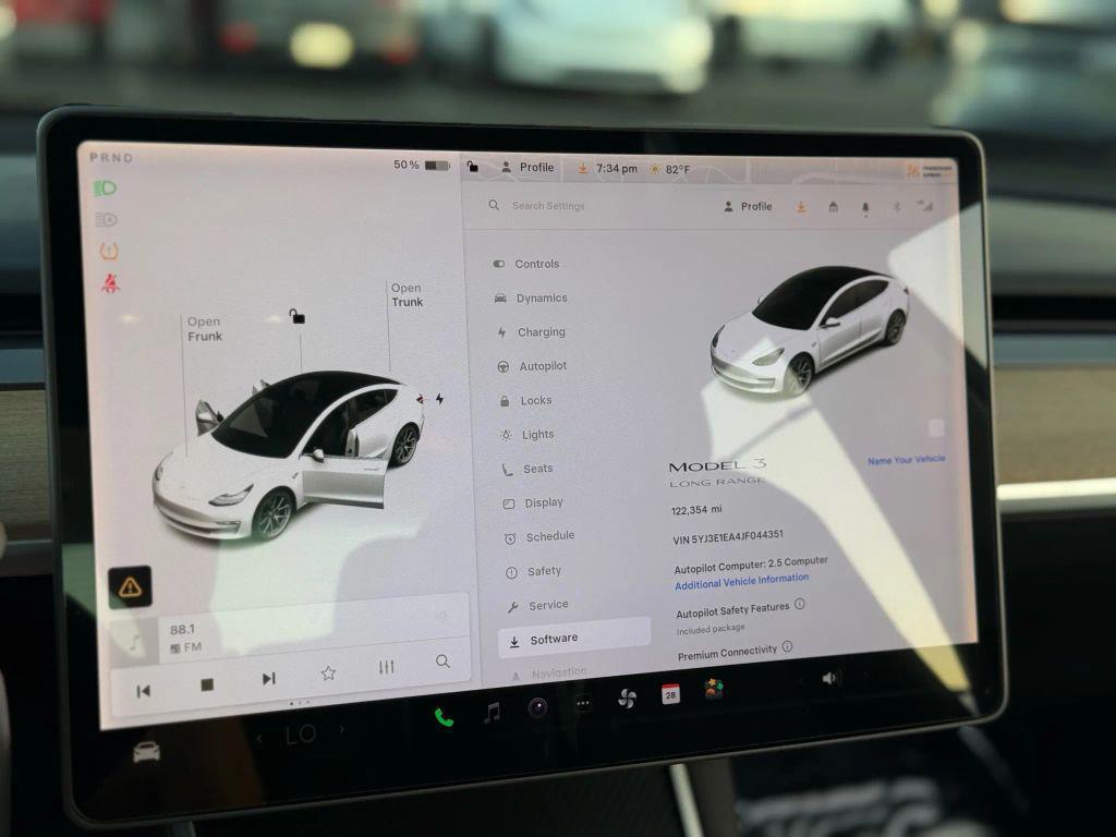 used 2018 Tesla Model 3 car, priced at $13,999