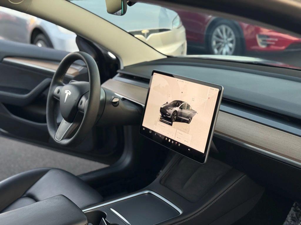 used 2023 Tesla Model 3 car, priced at $23,999