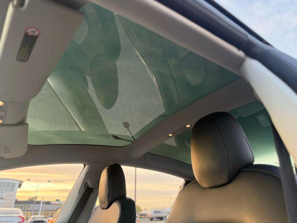 used 2018 Tesla Model 3 car, priced at $17,999