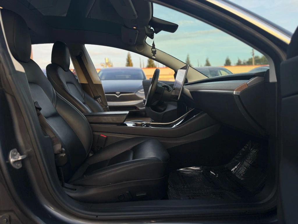 used 2018 Tesla Model 3 car, priced at $17,999