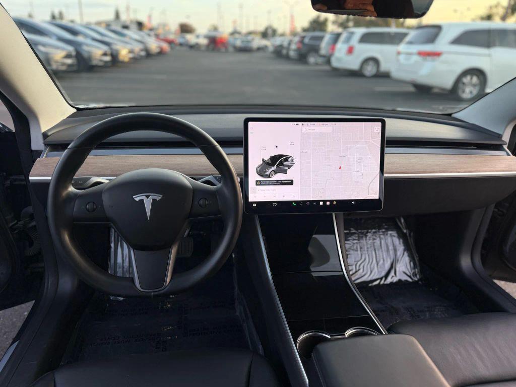 used 2018 Tesla Model 3 car, priced at $17,999