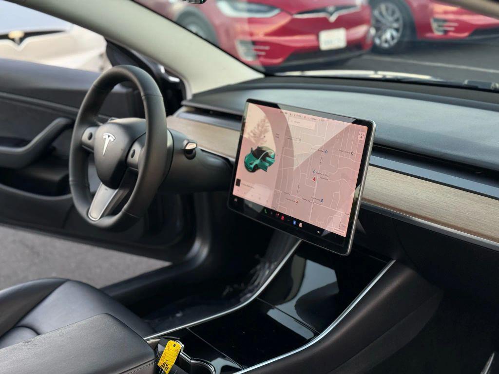 used 2019 Tesla Model 3 car, priced at $16,999